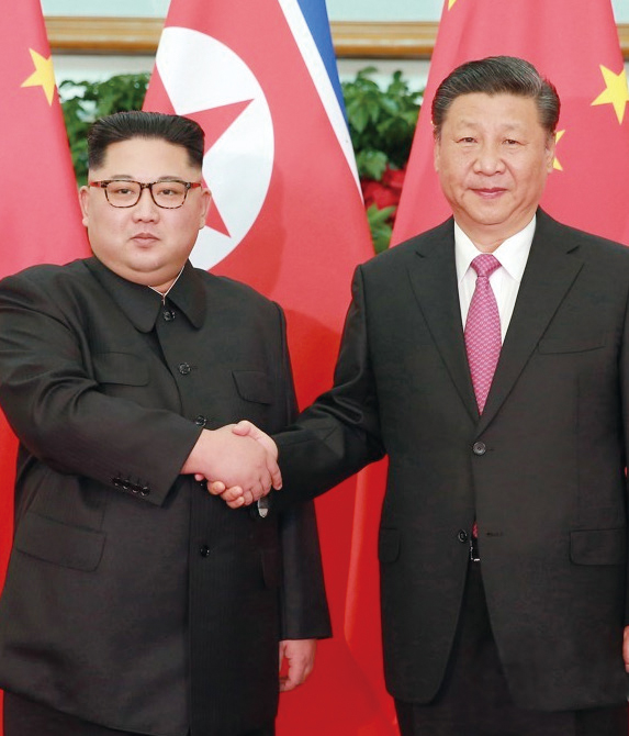 김정은 북한 국무위원장(좌)과 시진핑 중국 국가주석(우)